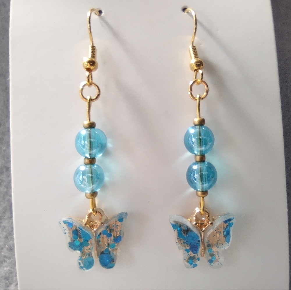 Dangle earrings, blue and gold color butterfly, 2 inches